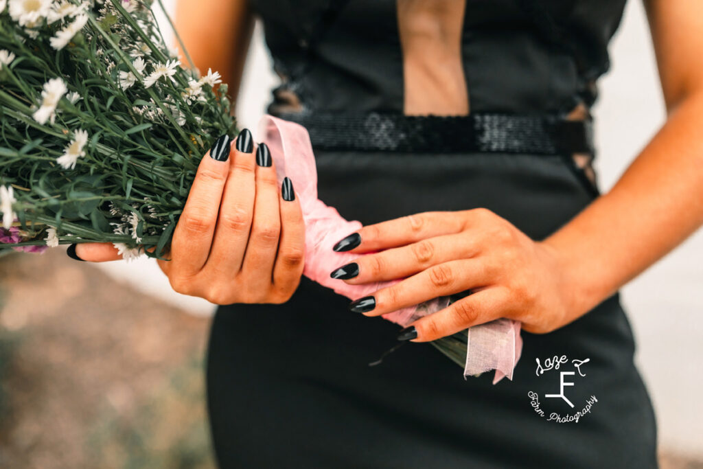 close up of nails and flowers