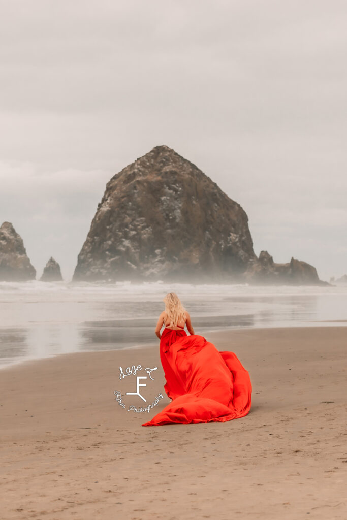 Reid in red dress on Canon Beach