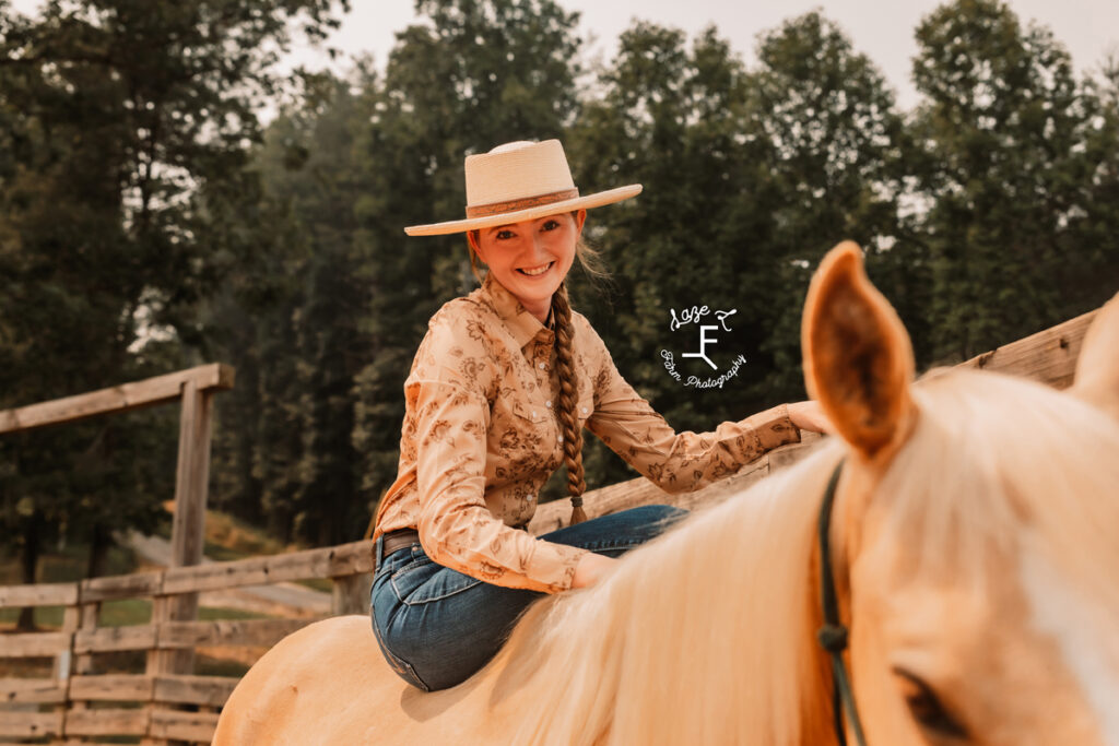 cowgirl sitting on horse