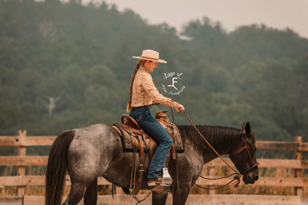 cowgirl riding horse