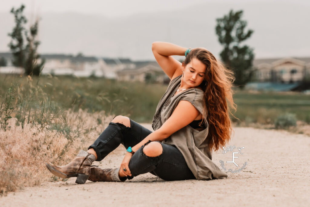 Savannah sitting on dirt road