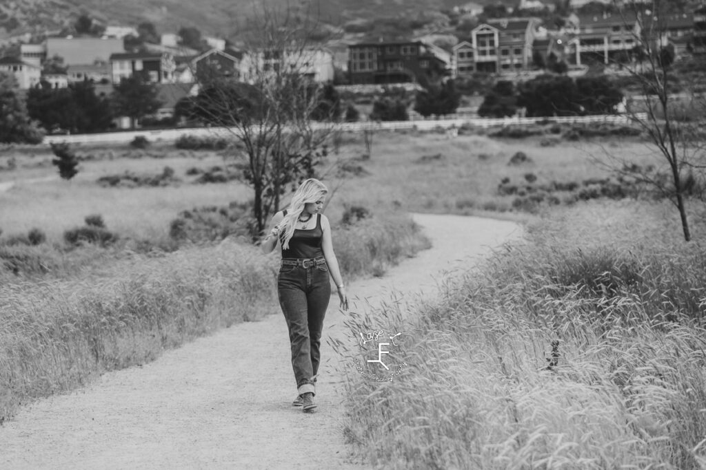 Reid walking in black and white