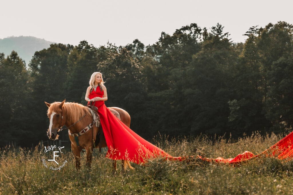 Blonde in red parachute dress sitting on Gus