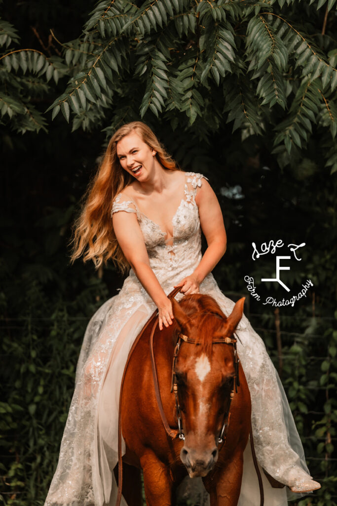 Morgan riding red horse in wedding dress