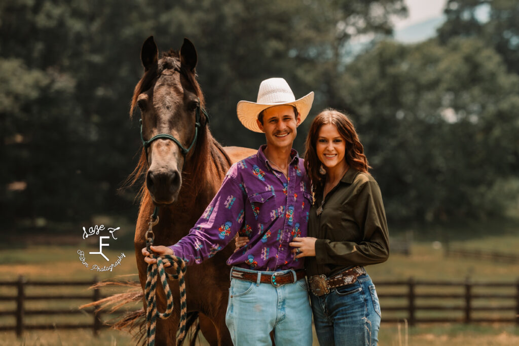 John and Ambry standing together with horse