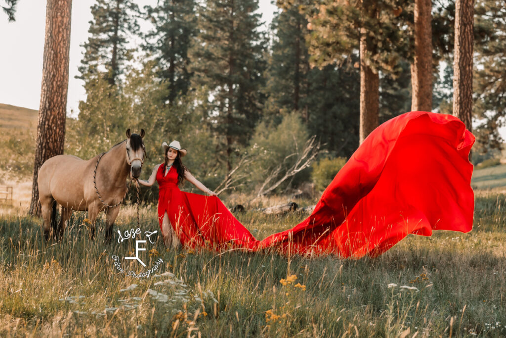 Dakota in red parachute dress with buckskin