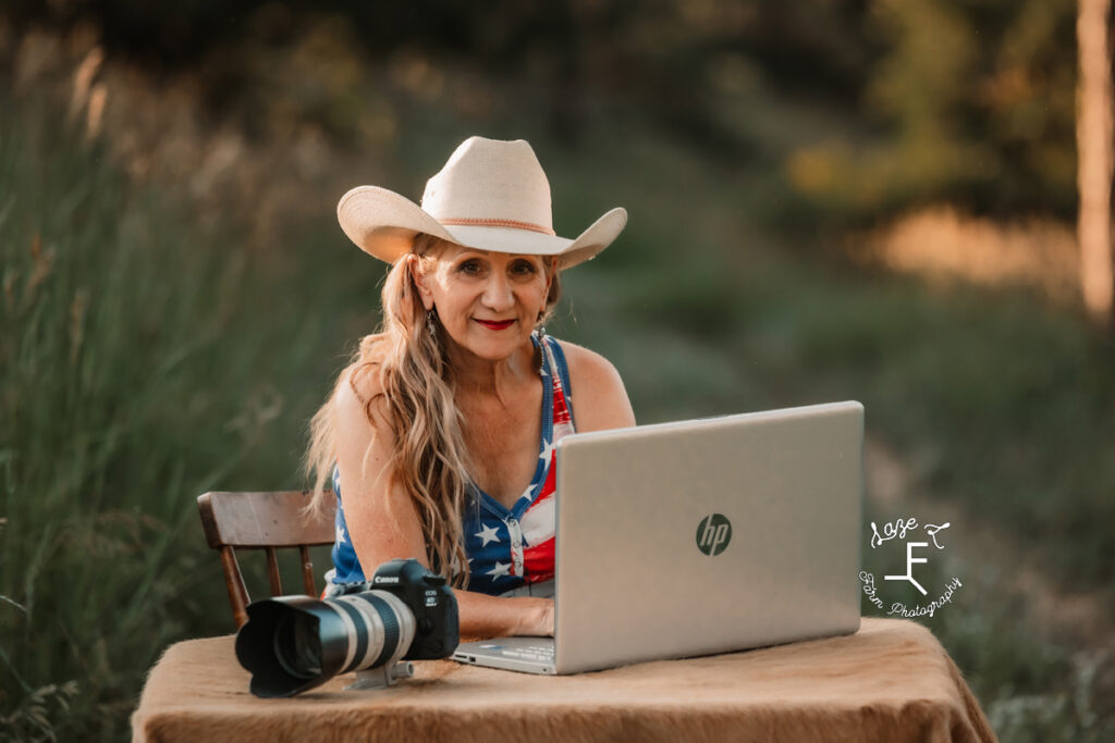 Theresa with camera and laptop