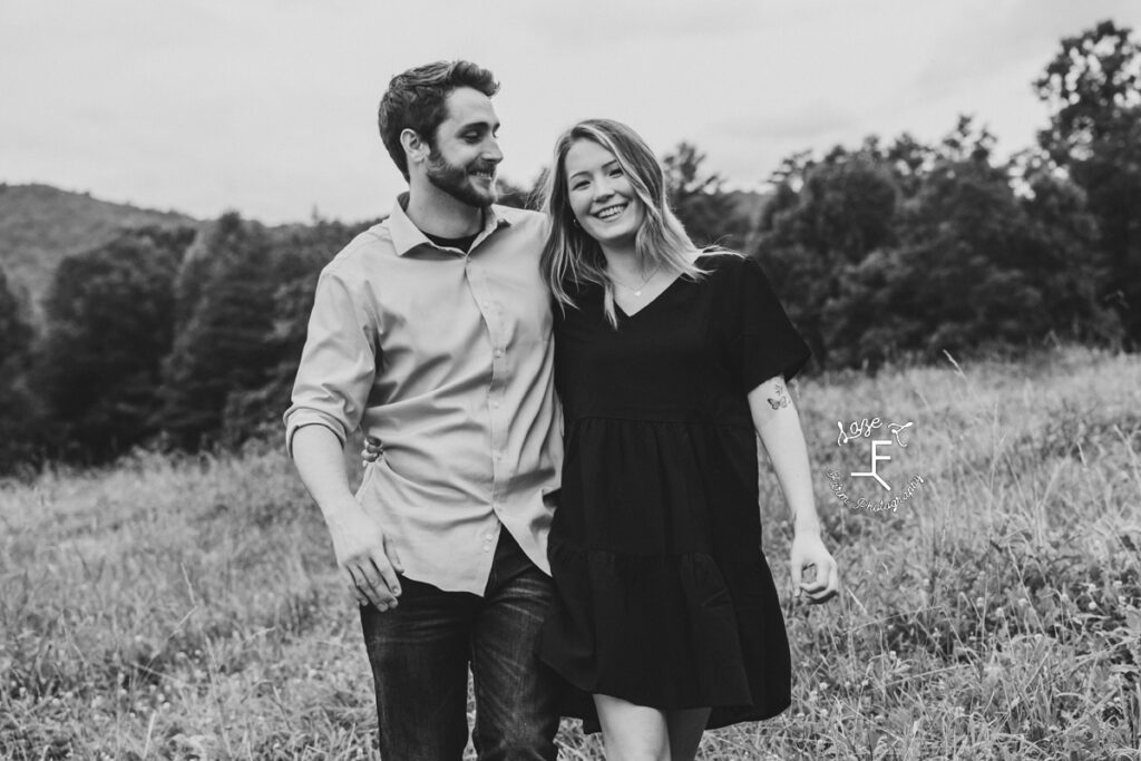 Young couple walking in black and white