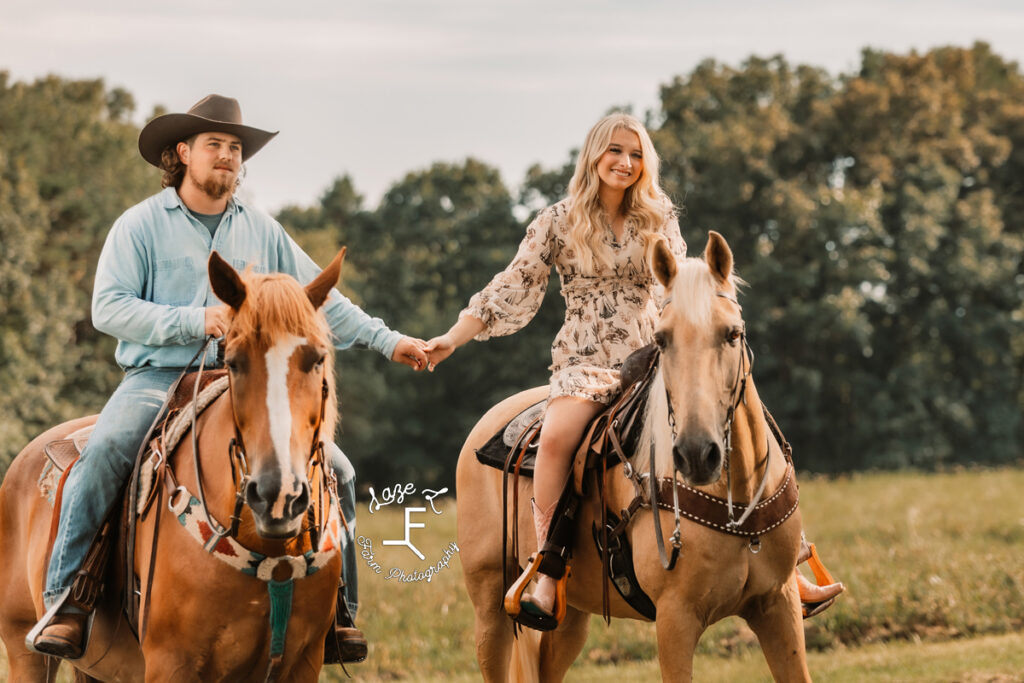 Haley and Ethan riding Ben and Gus holding hands