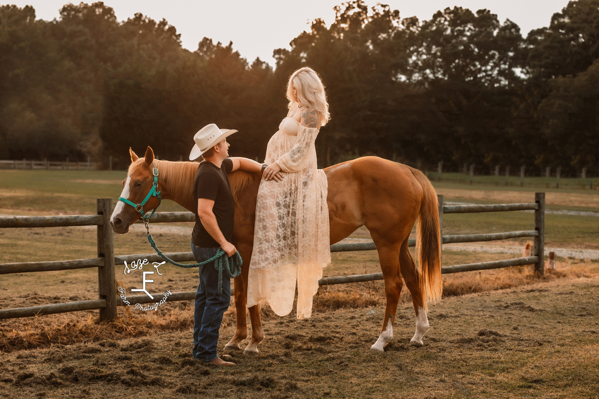 Nike on horseback with Nate standing with her