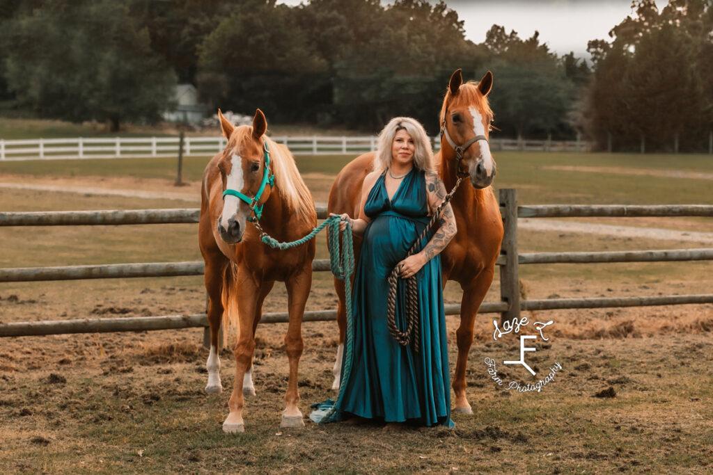 Nike with 2 horses in blue dress