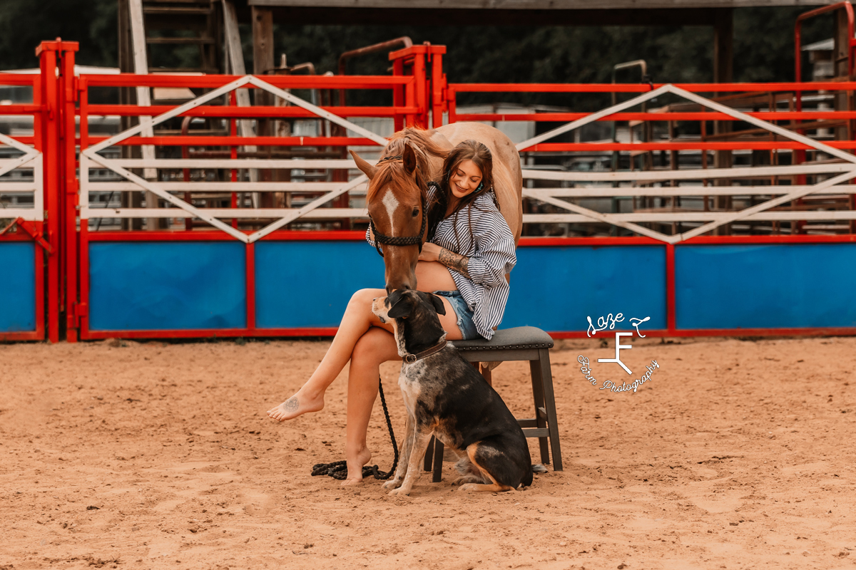 Kirstan with horse and dog in arena