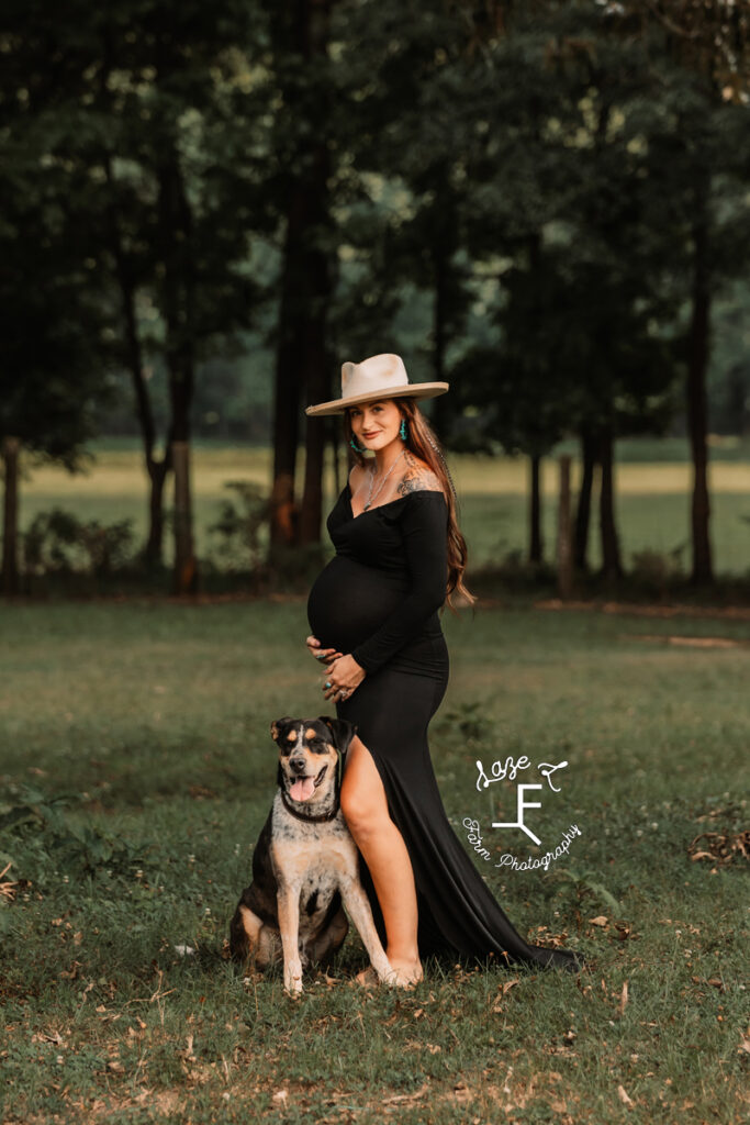 Kirstan in tan hat with her dog