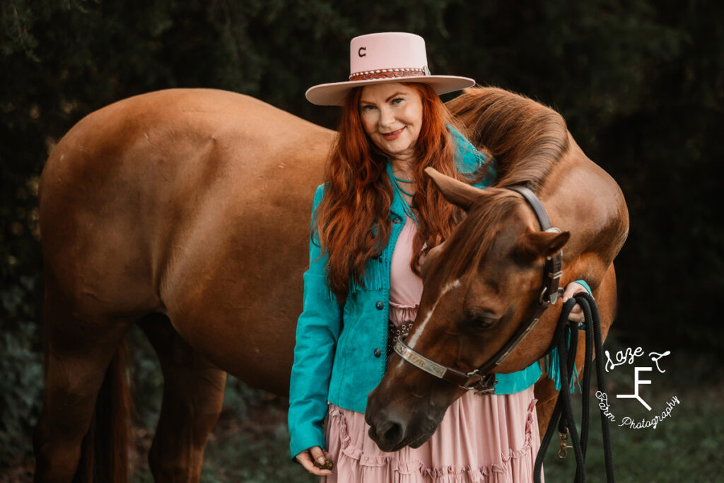 Heather standing with horse