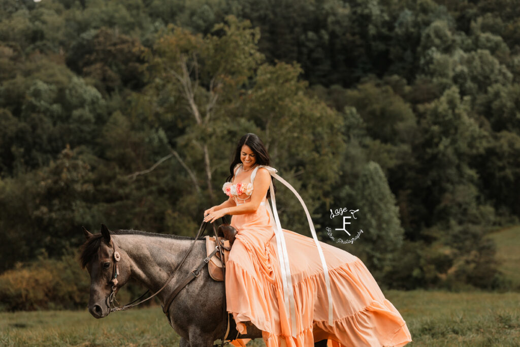 Danielle in pink dress riding Chex