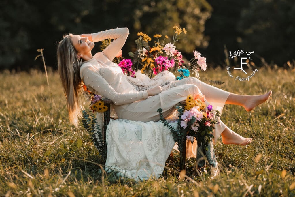 Sierra leaning back in flower chair