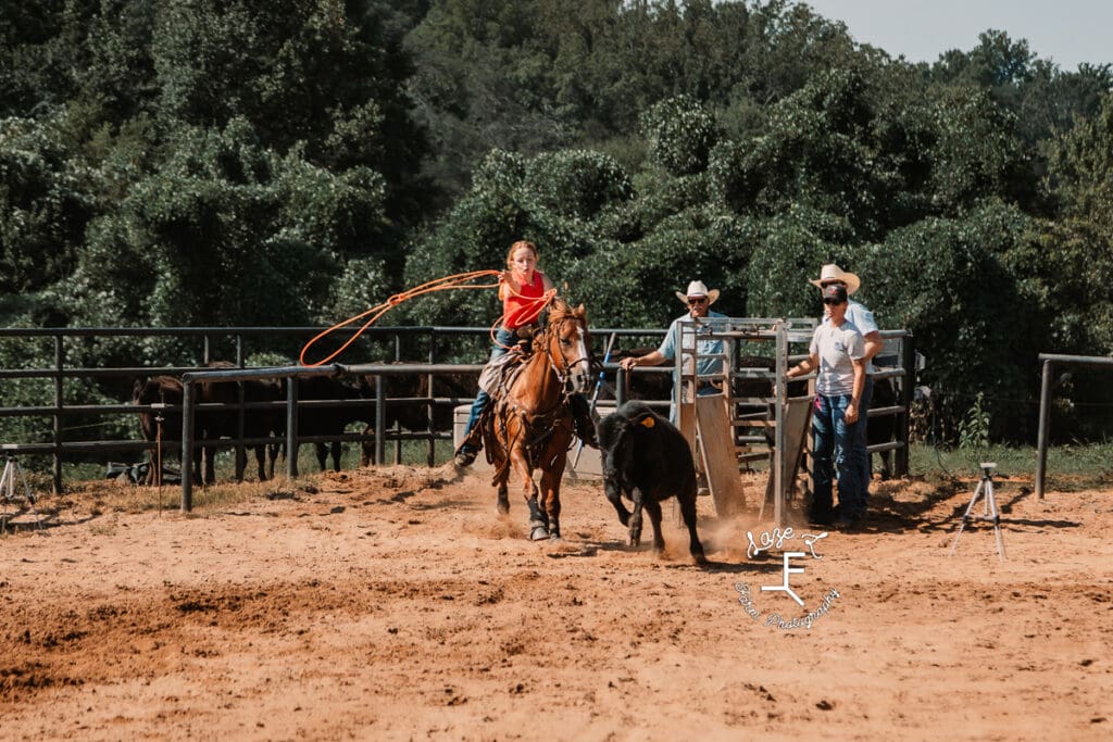 Breakaway roper in red shirt