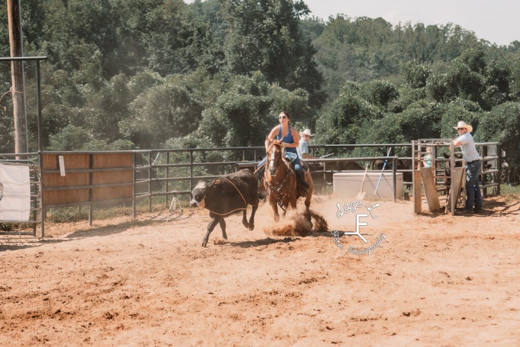 Breakaway roper in blue tank top