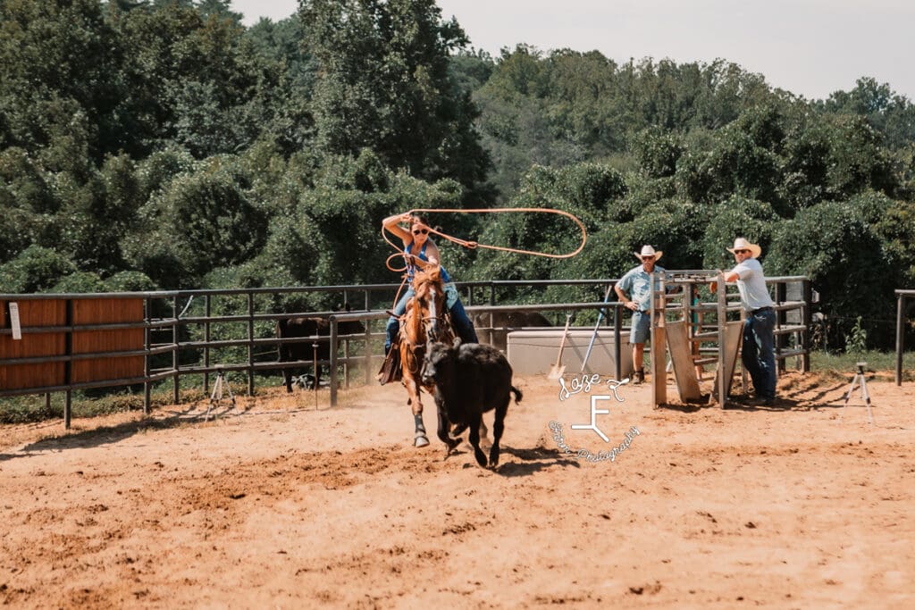 Breakaway roper swing rope over head