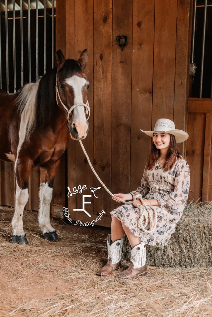 Natalie & paint pony looking at camera