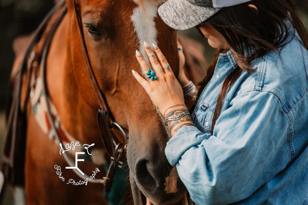 Halle petting Gus showing rings