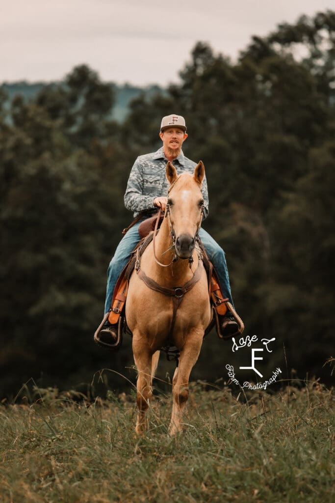 Kyle on his horse facing the camera