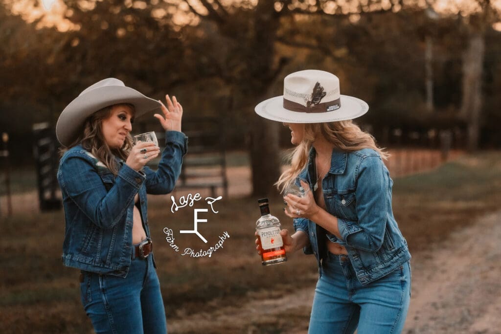 cowgirls in blue jeans with jack daniels