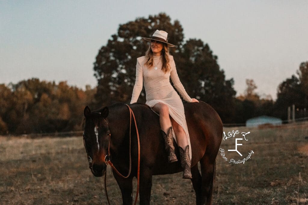 cowgirl looking left in pearl dress