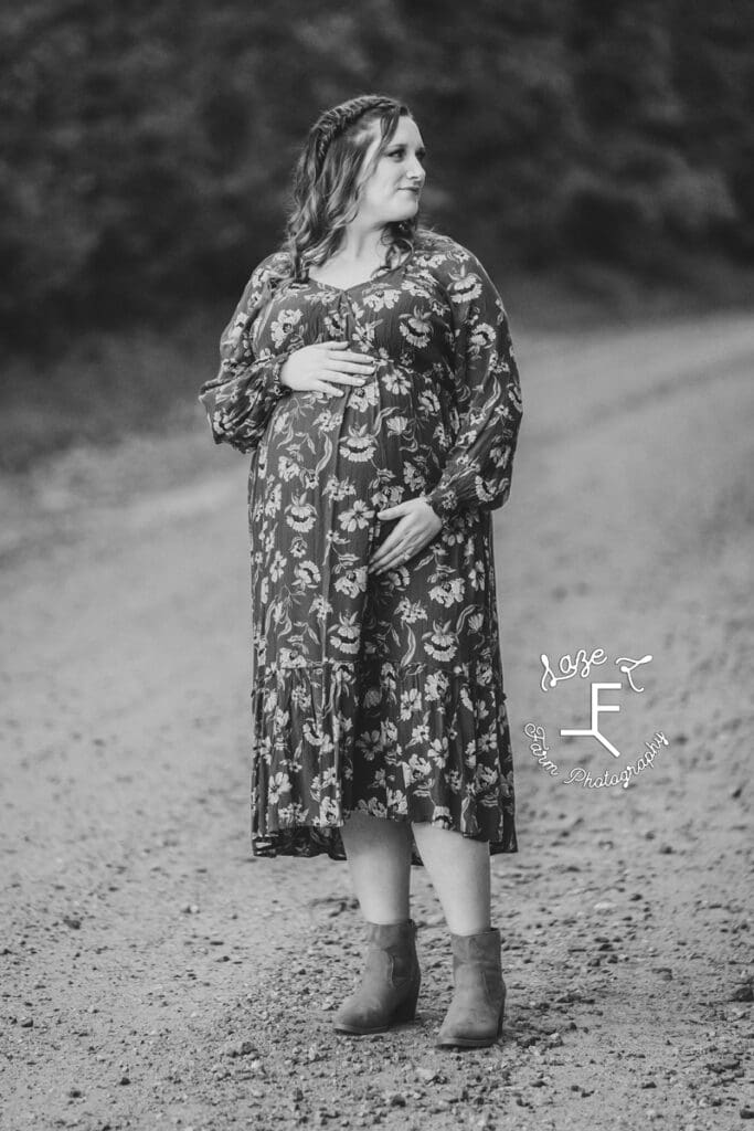 Ashley holding bump in black and white