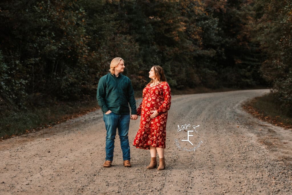 Ashley and Devin walking on dirt raod