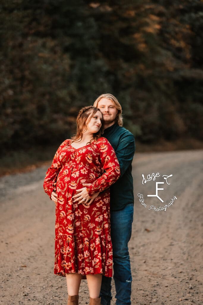 Ashley and Devin standing together on dirt road