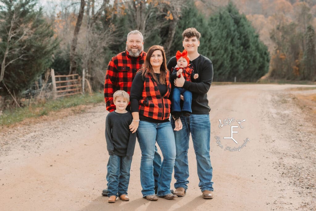 Childers family standing together on dirt road