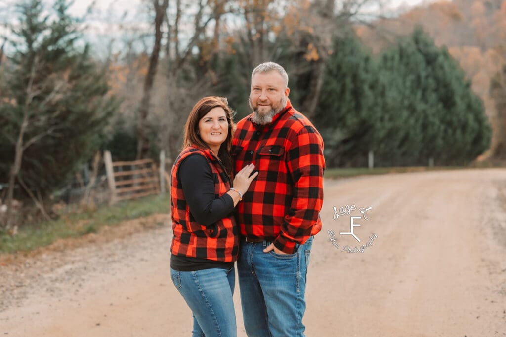 Mom and Dad standing together on dirt road