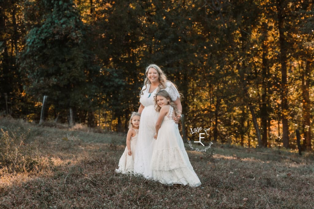 Mom and girls in white dresses