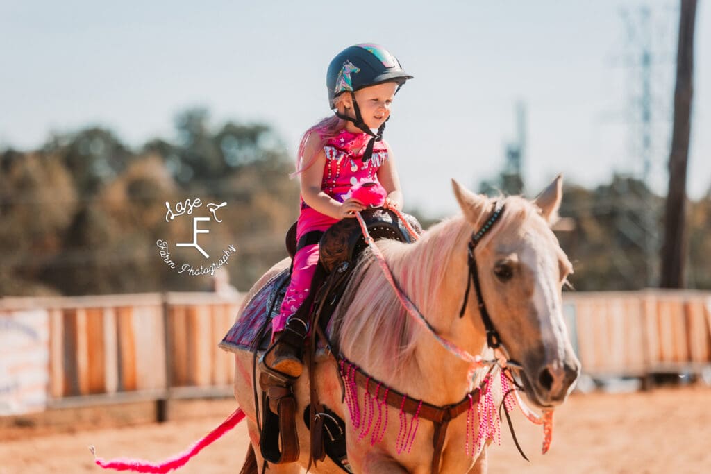 Rafter T Fun Show little girl on palomino