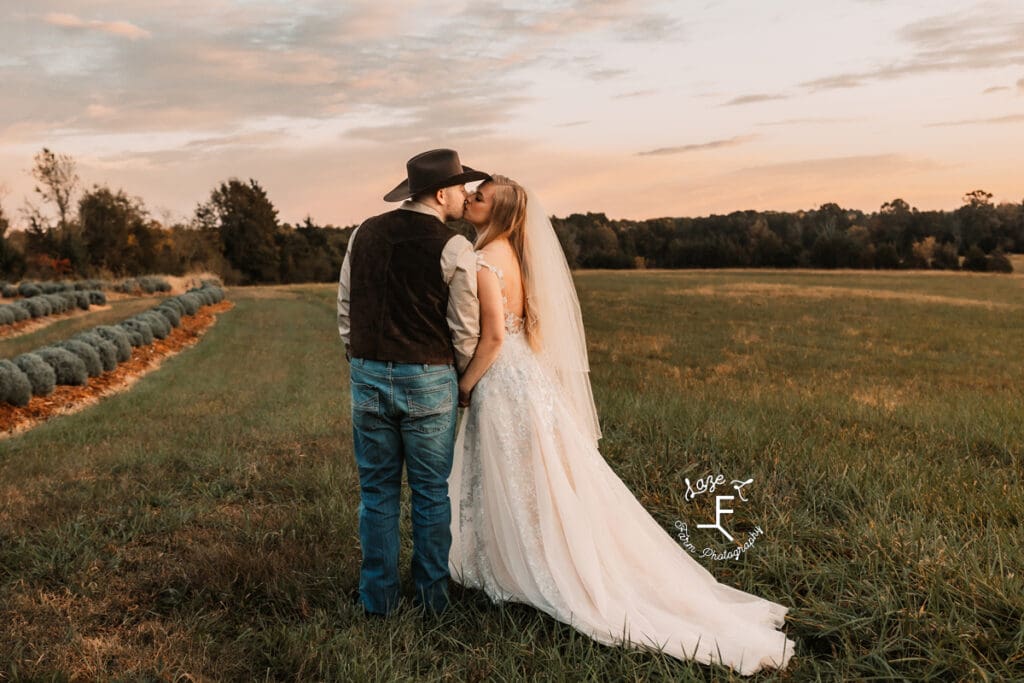 Morgan and Tanner standing kissing