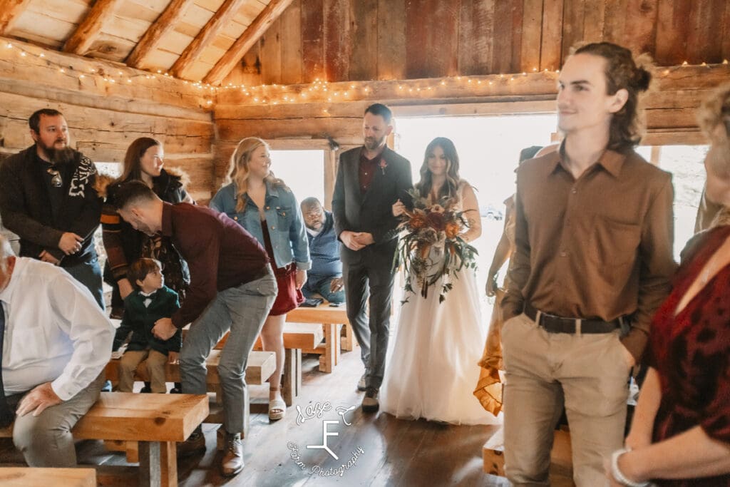 Bride walking down aisle with dad