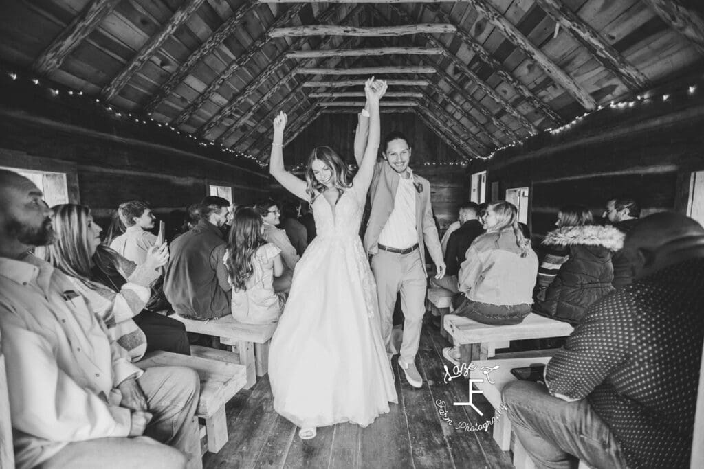 Husband and wife walking back down aisle