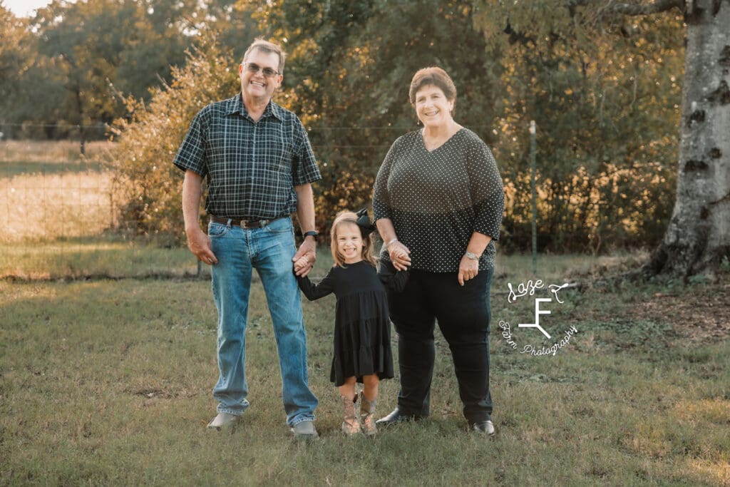 little girl with dad's side grandparents