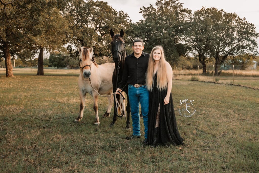 husband and wife with 2 horses