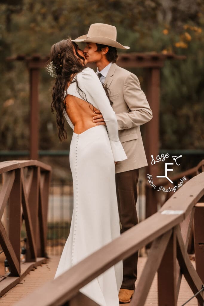 TX Wedding bride and groom kissing after first look