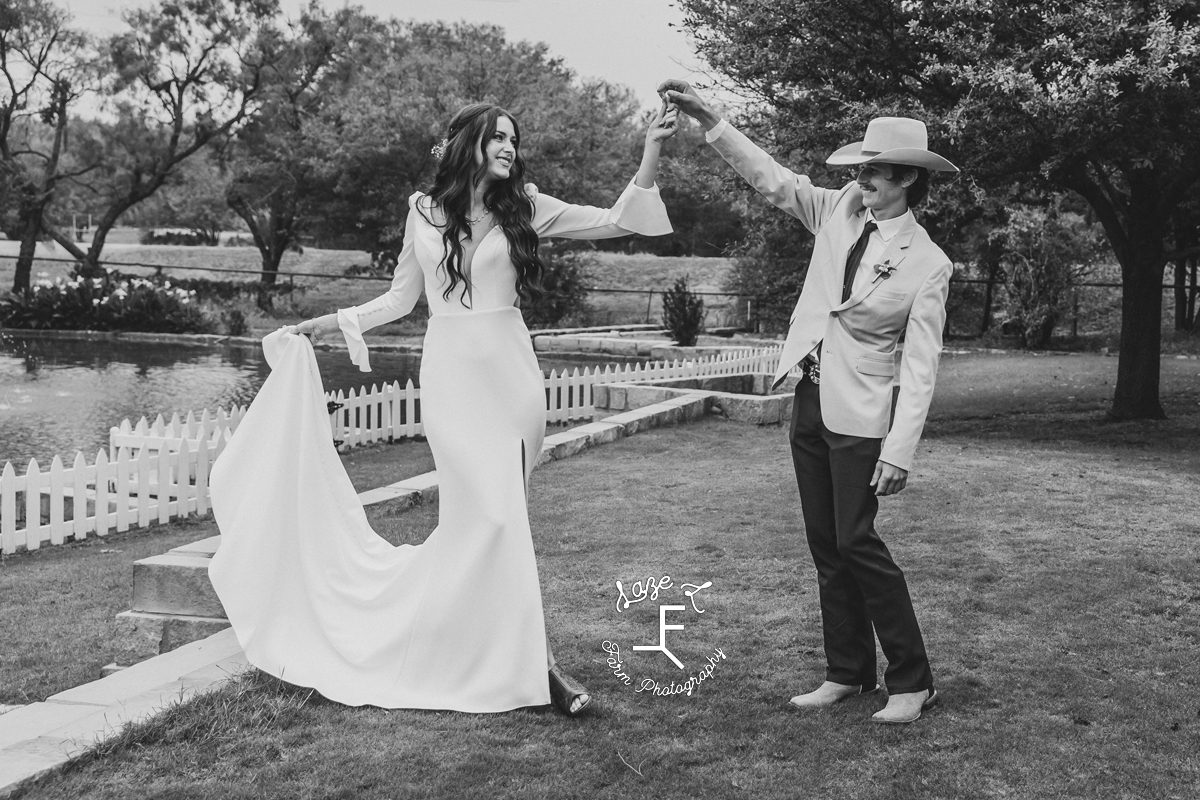 TX Wedding bride and groom dancing in black and white