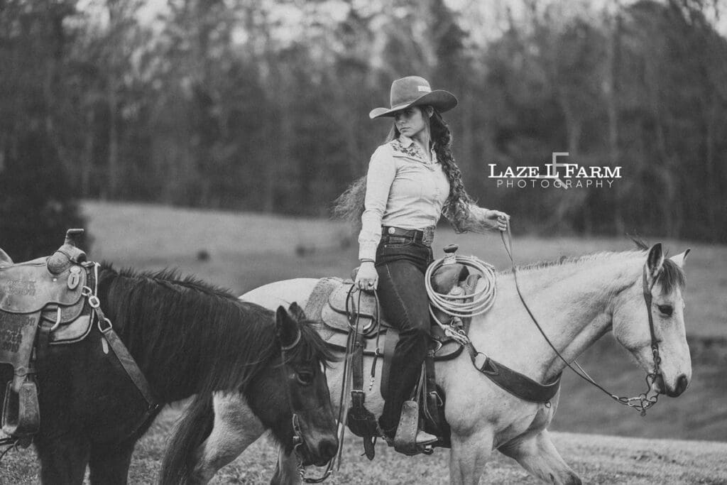cowgirl riding her horse