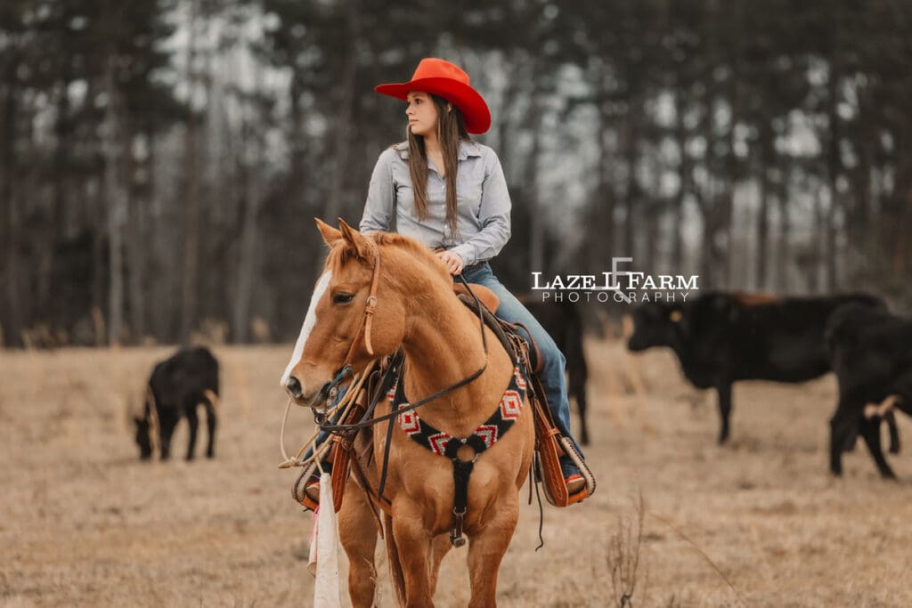cowgirl sitting on her horse