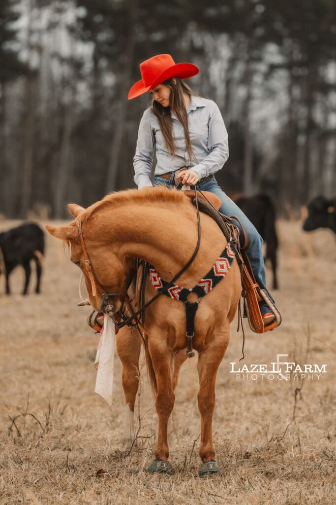 cowgirl sitting on her horse
