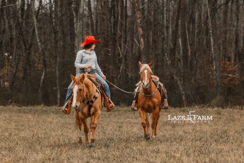cowgirl riding her horse