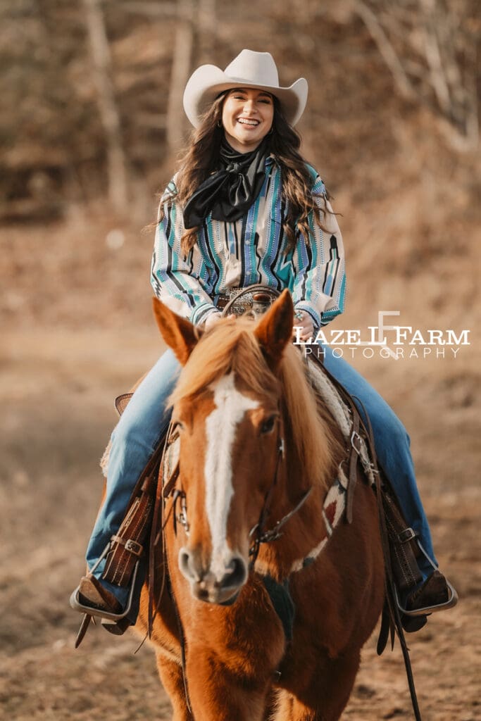 cowgirl riding a horse