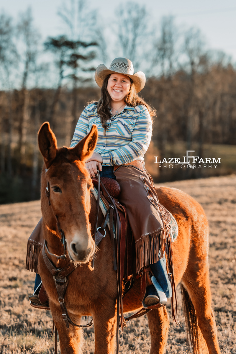 cowgirl riding mule
