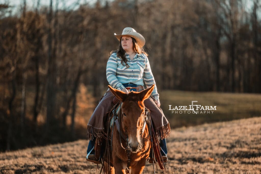cowgirl riding mule