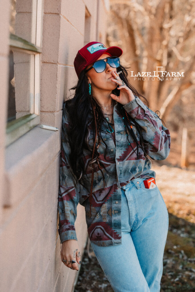 cowgirl smoking a cigarette